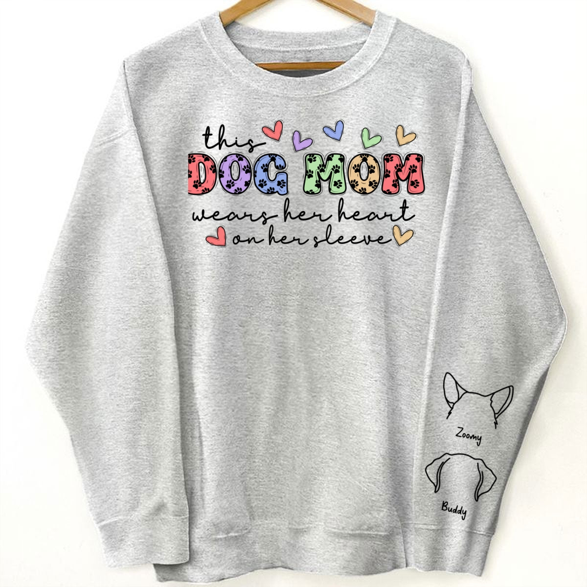 Dog Mom Colorful Paw Pattern, This Dog Mom Wears Her Heart On Her Sleeve, Custom Dog Name, Dog Mama, Personalized Sleeve Printed Sweatshirt